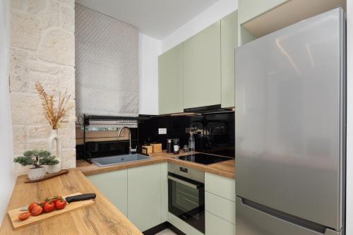 Η κουζίνα ή μικρή κουζίνα στο Sun n Salt Private Villas