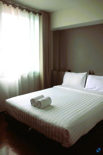 Ένα ή περισσότερα κρεβάτια σε δωμάτιο στο Lux Rooms Night Bazaar