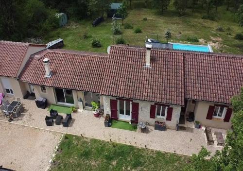 an aerial view of a house with red roof at La- ch'tite-Gamassette in Carlucet