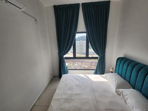Una cama o camas en una habitación de The Horizon - Ipoh
