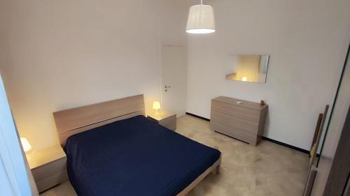 Postel nebo postele na pokoji v ubytování Appartamento I CEDRI