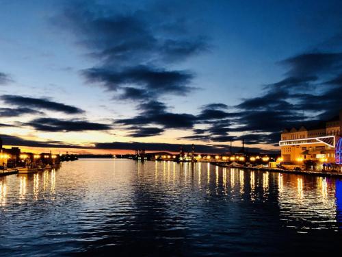 a view of a river at night at Kushiro Prince Hotel in Kushiro