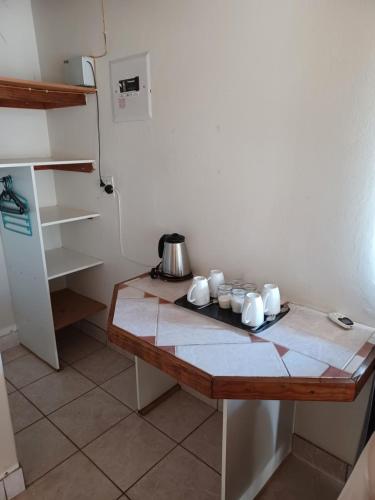 Η κουζίνα ή μικρή κουζίνα στο Umziki Chalets