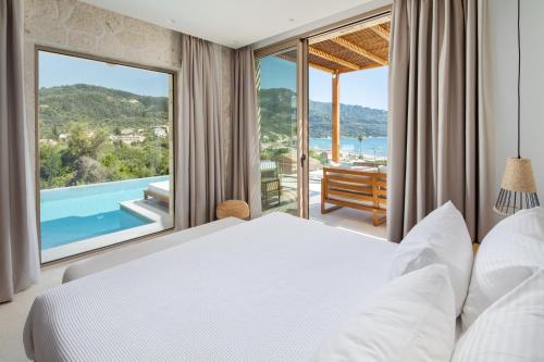 Postel nebo postele na pokoji v ubytování Sun n Salt Private Villas