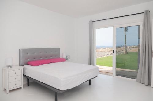 Ένα ή περισσότερα κρεβάτια σε δωμάτιο στο Chalet Marpacos