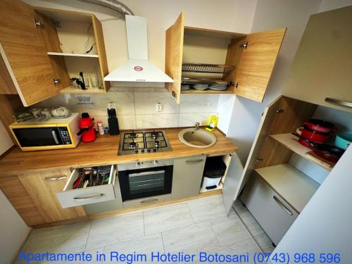 Η κουζίνα ή μικρή κουζίνα στο Apartament cu 2 dormitoare decomandat/Utilat acceptam plata cu cardul oferim factura
