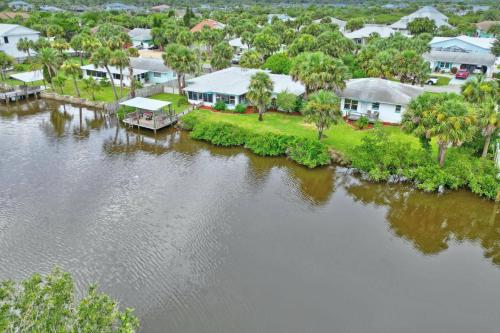an aerial view of a river with houses at Palm Paradise Waterfront Home - Flagler Beach - Dock - Pet Friendly - Close To The Beach in Flagler Beach