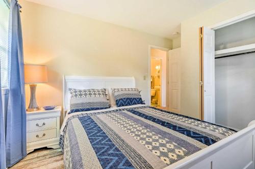 a bedroom with a large bed and a window at Long Beach Hideaway Walk to Beach, Shops and Bars! in Long Beach