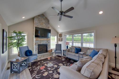 a living room with a couch and a fireplace at Patio and Yard Newly Built Retreat in Ronks! in Ronks