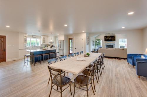 a dining room and living room with a table and chairs at Patio and Yard Newly Built Retreat in Ronks! in Ronks
