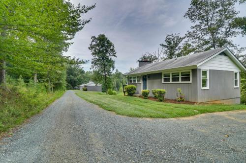 a house on a gravel road at Charlottesville Getaway in Baileys Retreat! in Crozet