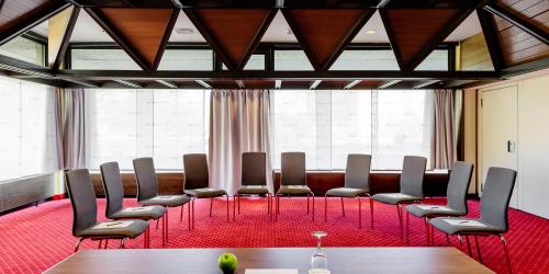 a conference room with chairs and a table at ACHAT Hotel Braunschweig in Braunschweig