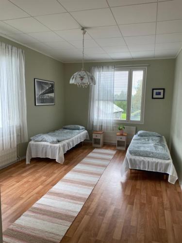 Postel nebo postele na pokoji v ubytování Poppeli Guest House