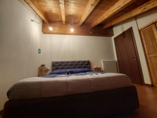 Postel nebo postele na pokoji v ubytování Ai piedi della grigna