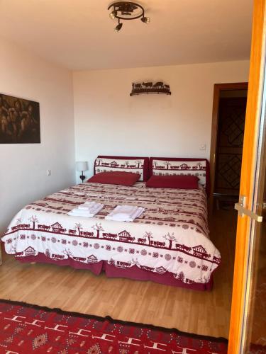 Postel nebo postele na pokoji v ubytování La casetta di Crans