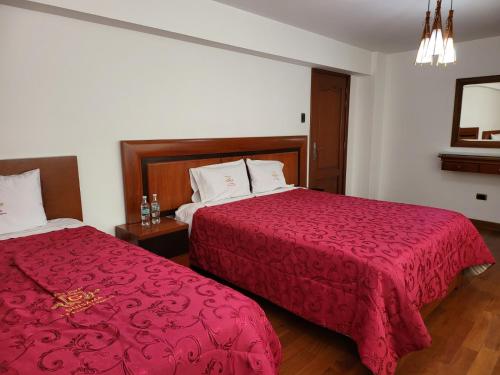 Katil atau katil-katil dalam bilik di Gran Hotel Guisama