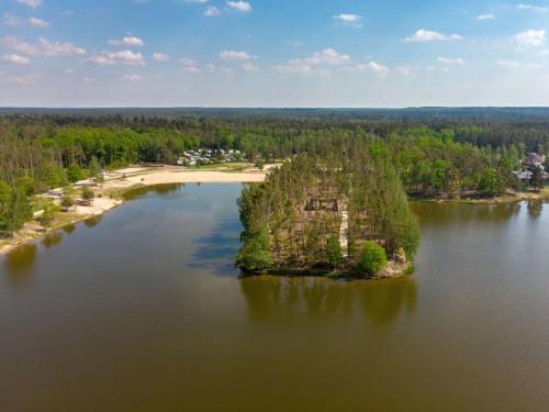 an island in the middle of a lake at Holiday Home Kemp Stříbrný rybník-6 by Interhome in Hradec Králové