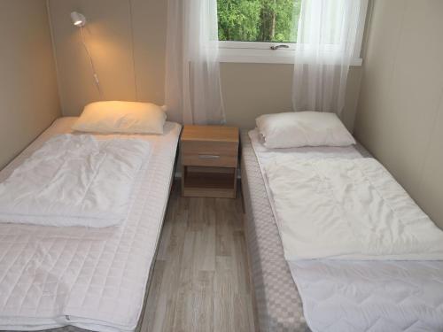 Ένα ή περισσότερα κρεβάτια σε δωμάτιο στο Holiday Home Stortaren by Interhome