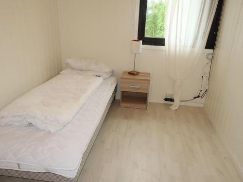 Postel nebo postele na pokoji v ubytování Holiday Home Taren by Interhome