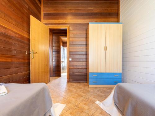 Katil atau katil-katil dalam bilik di Chalet Tropical 4 by Interhome