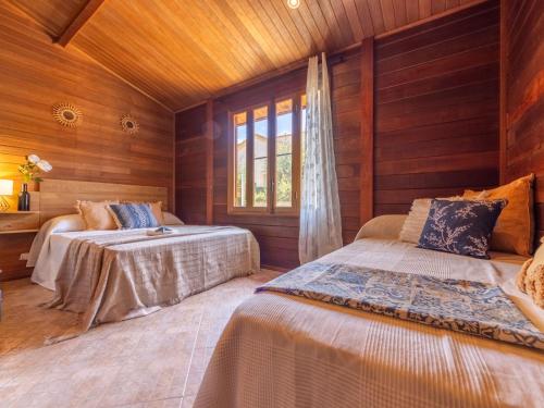 Katil atau katil-katil dalam bilik di Chalet Tropical 2 by Interhome