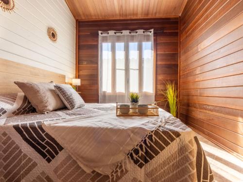 Katil atau katil-katil dalam bilik di Chalet Tropical 3 by Interhome