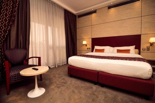 Voodi või voodid majutusasutuse Hôtel Sarakawa toas