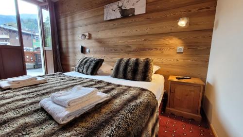 Postel nebo postele na pokoji v ubytování Hotel Christiania