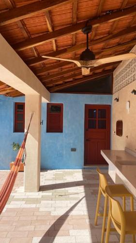 a house with a wooden ceiling and a patio at Trilliza-Verde in Campeche