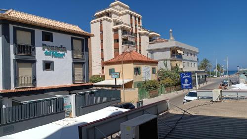 a view of a city street with buildings at APARTAMENTOS Posada Del Mar in Los Mártires