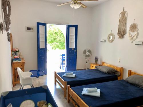 Ένα ή περισσότερα κρεβάτια σε δωμάτιο στο Kastri Apartments