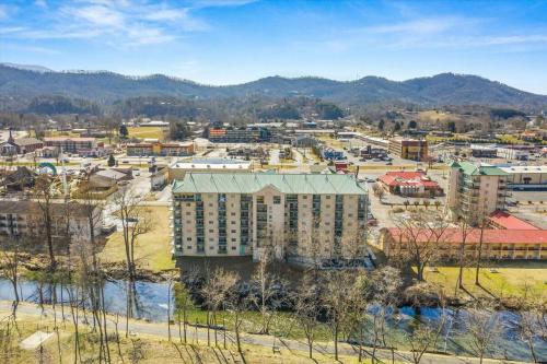an aerial view of a city with mountains in the background at River Place Condos #102 2BD in Pigeon Forge
