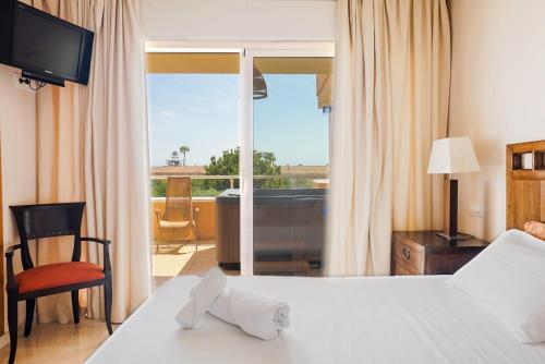 Postel nebo postele na pokoji v ubytování Malibu Mansions Increible apartamento con jacuzzi