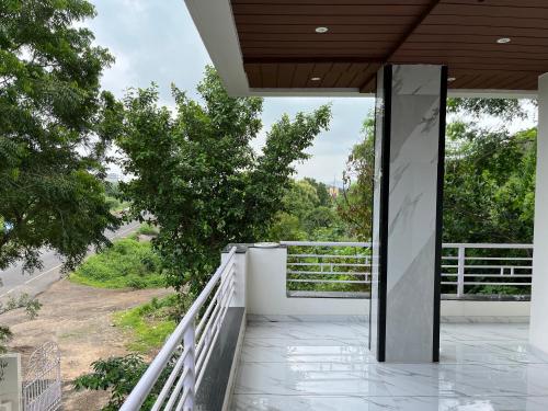 a view from the balcony of a house at Shree Vinayak Home Stay in Garudeshwar