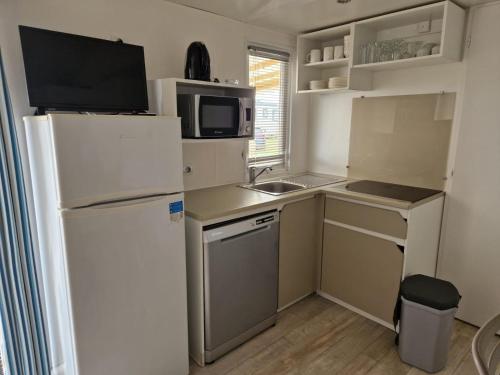 Η κουζίνα ή μικρή κουζίνα στο Mobil-home A Douarnenez