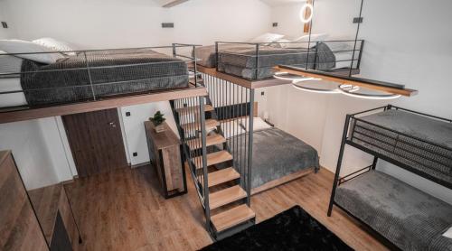 Apartmánový dům Sklípekにあるベッド