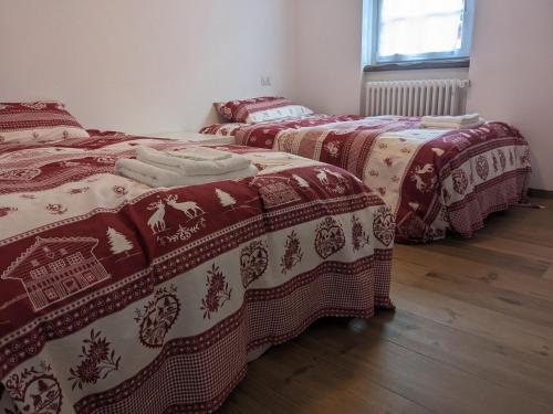 Postel nebo postele na pokoji v ubytování Casa della Frua - Frudarhus