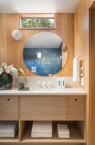 a bathroom with a sink and a mirror at The Sea Ranch Lodge in Sea Ranch