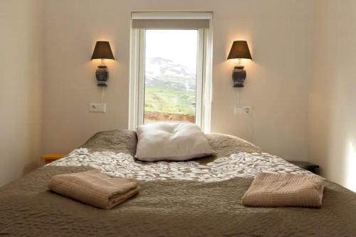 En eller flere senger på et rom på Private country house, luxury and warmth, incredible views