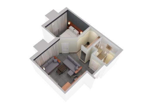 a rendering of a floor plan of aominium at Courtyard by Marriott Waterloo St. Jacobs in Waterloo