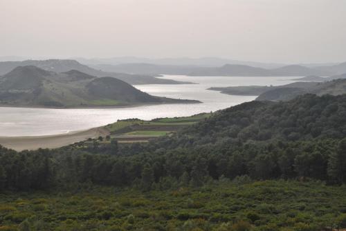 a view of a beach and a body of water at Ferme Dar Aicha green Bellouta in Bellouta