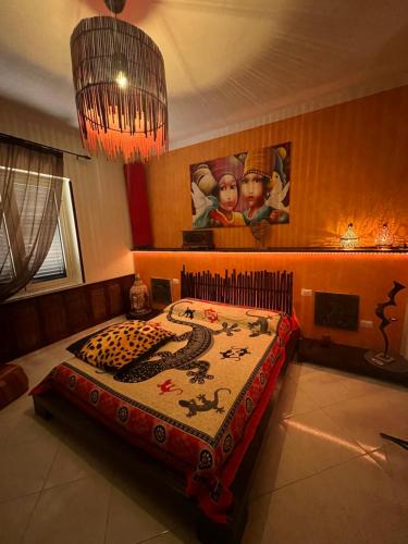 a bedroom with a bed with a rug on it at B&b Villa Romano in Salerno