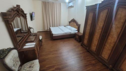 Ένα ή περισσότερα κρεβάτια σε δωμάτιο στο 7 Days Hotel Homy Home