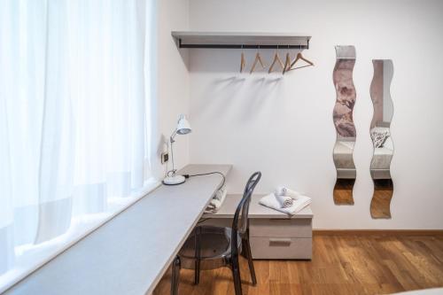 a home office with a desk and a window at Villa Bonafata b&b in Trieste
