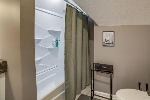a bathroom with a shower and a toilet at Family-Friendly Pittsburgh Home about 4 Mi to Downtown in Pittsburgh