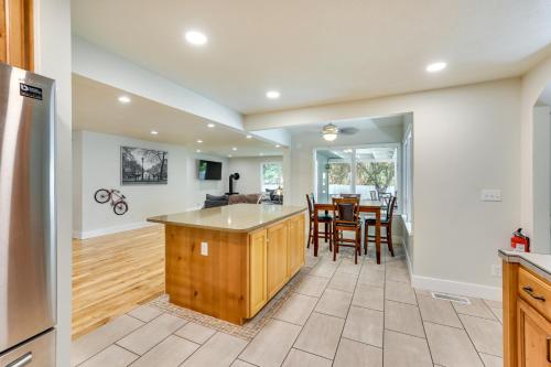 an open kitchen and dining room with a table at Twin Falls Vacation Rental with Yard Less Than 3 Mi to Town! in Twin Falls