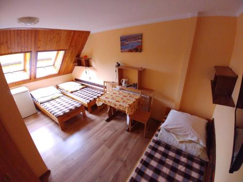 an aerial view of a room with a table at DG EWA w Polańczyku in Polańczyk