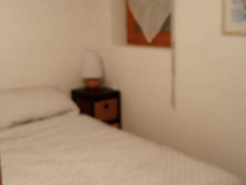 Кровать или кровати в номере Appartement Saint-Jean-d'Aulps, 2 pièces, 4 personnes - FR-1-573-117