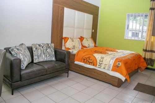 Ένα ή περισσότερα κρεβάτια σε δωμάτιο στο Longho Lodge Bundoma - Buea