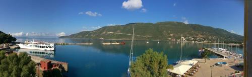 a large body of water with boats in it at Orfeas Rooms in Vasiliki